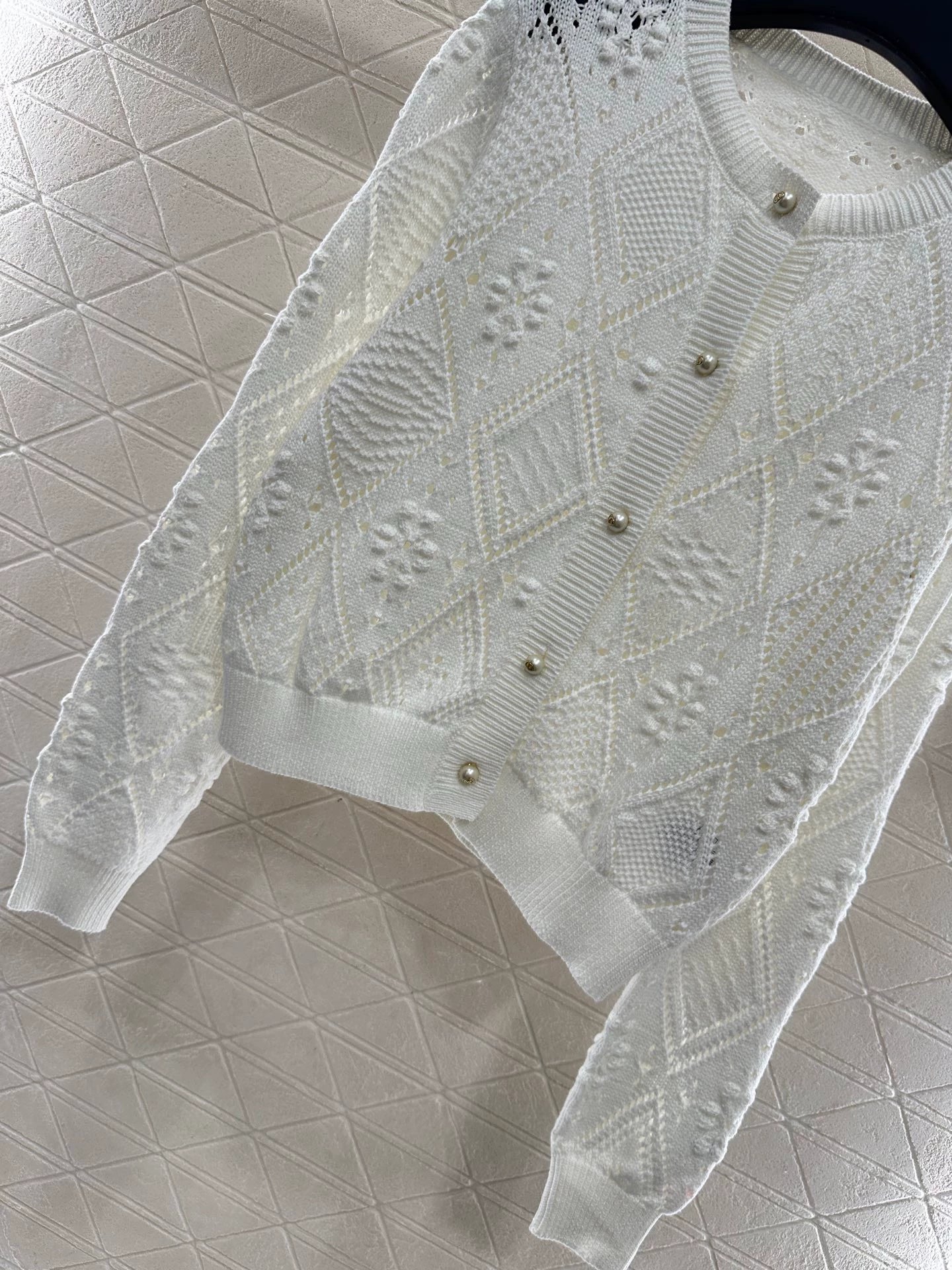 Hollow jacquard knitted cardigan