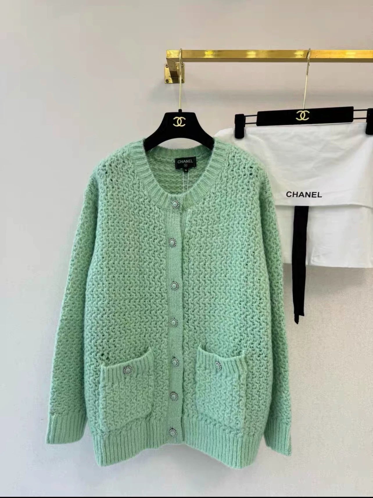 Mint green hollow knitted cardigan