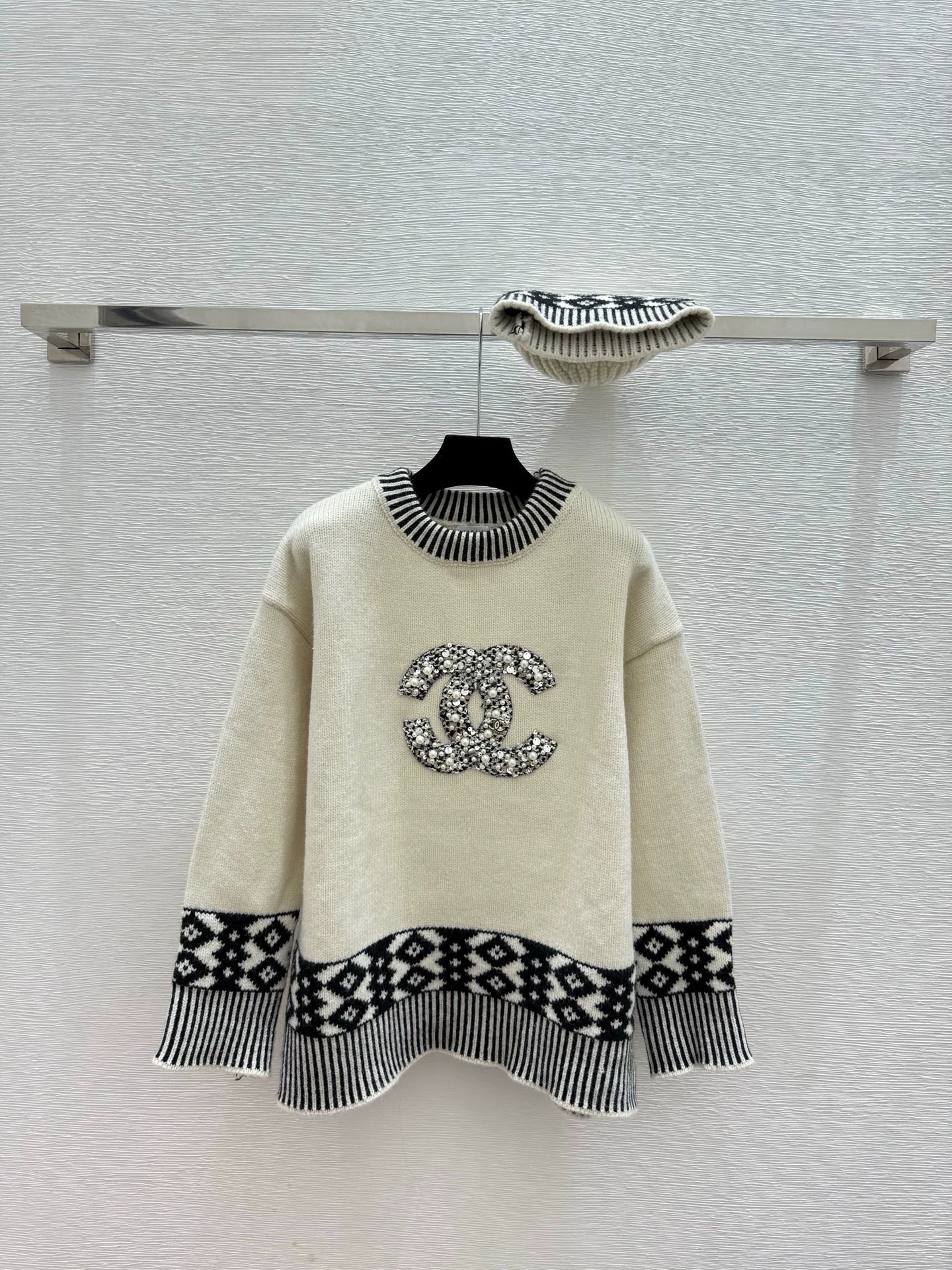 Black and white contrasting diamond patterned sweater