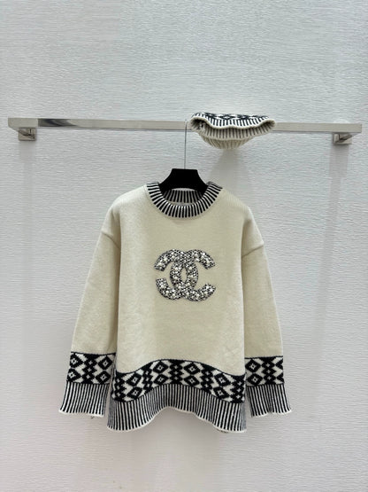 Black and white contrasting diamond patterned sweater