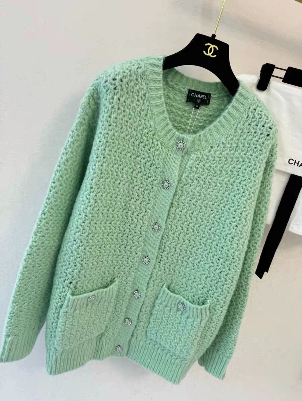 Mint green hollow knitted cardigan