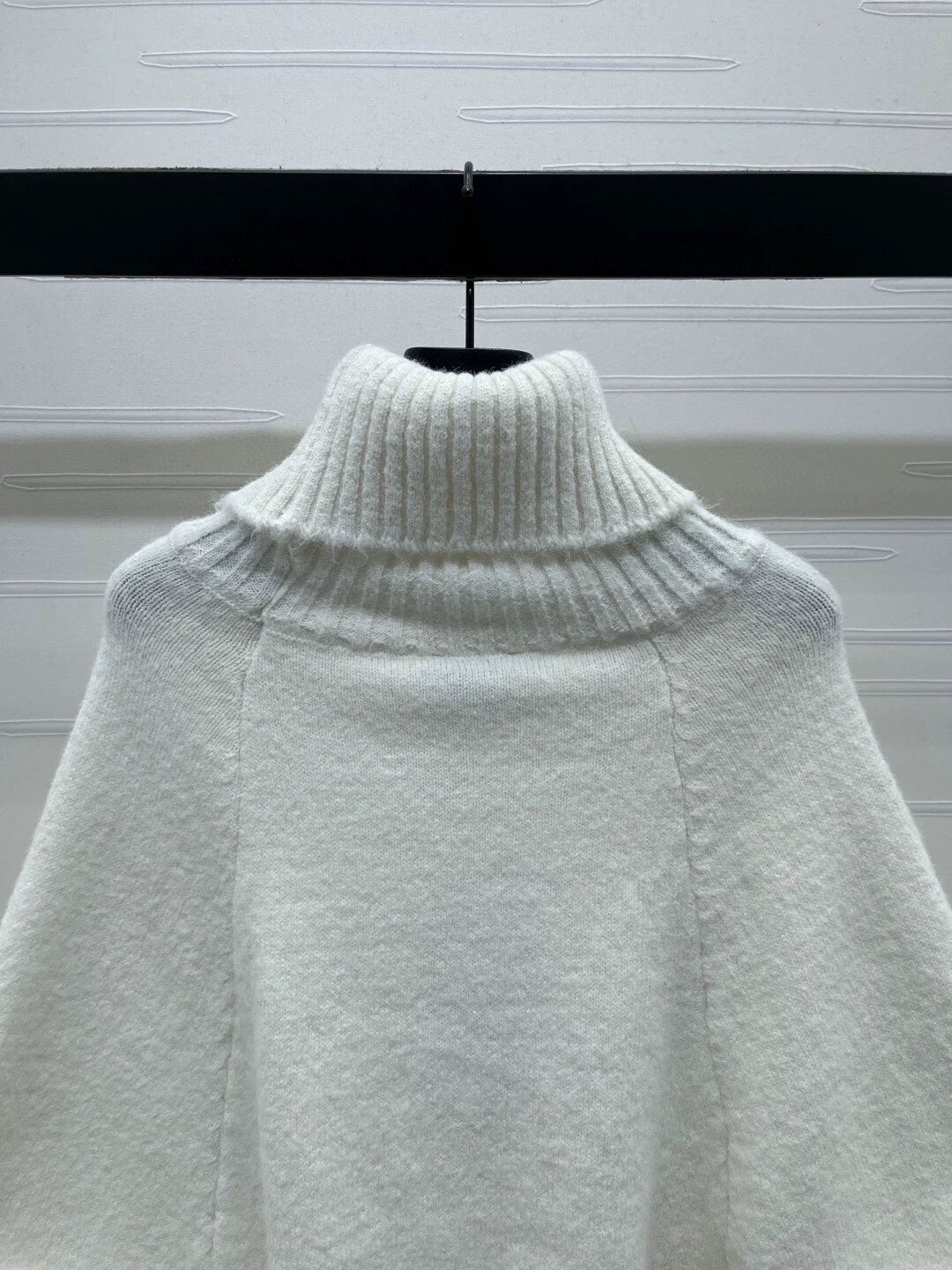 White high necked sweater