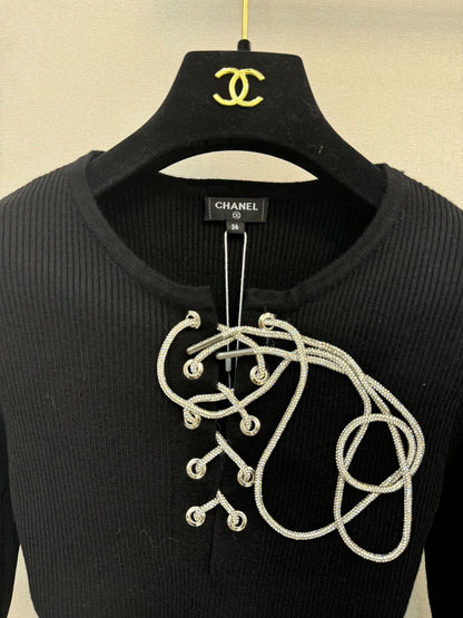 Black knitted long sleeved top