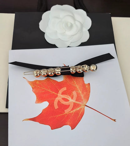 Bow tie CC hair clip