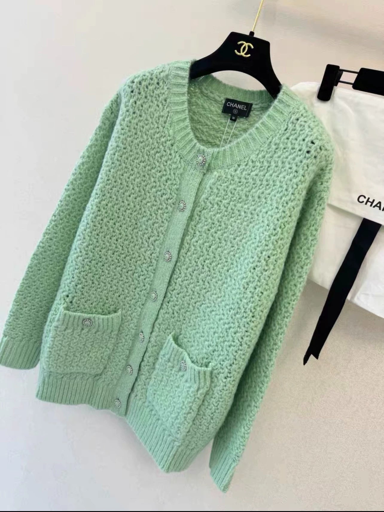 Mint green hollow knitted cardigan