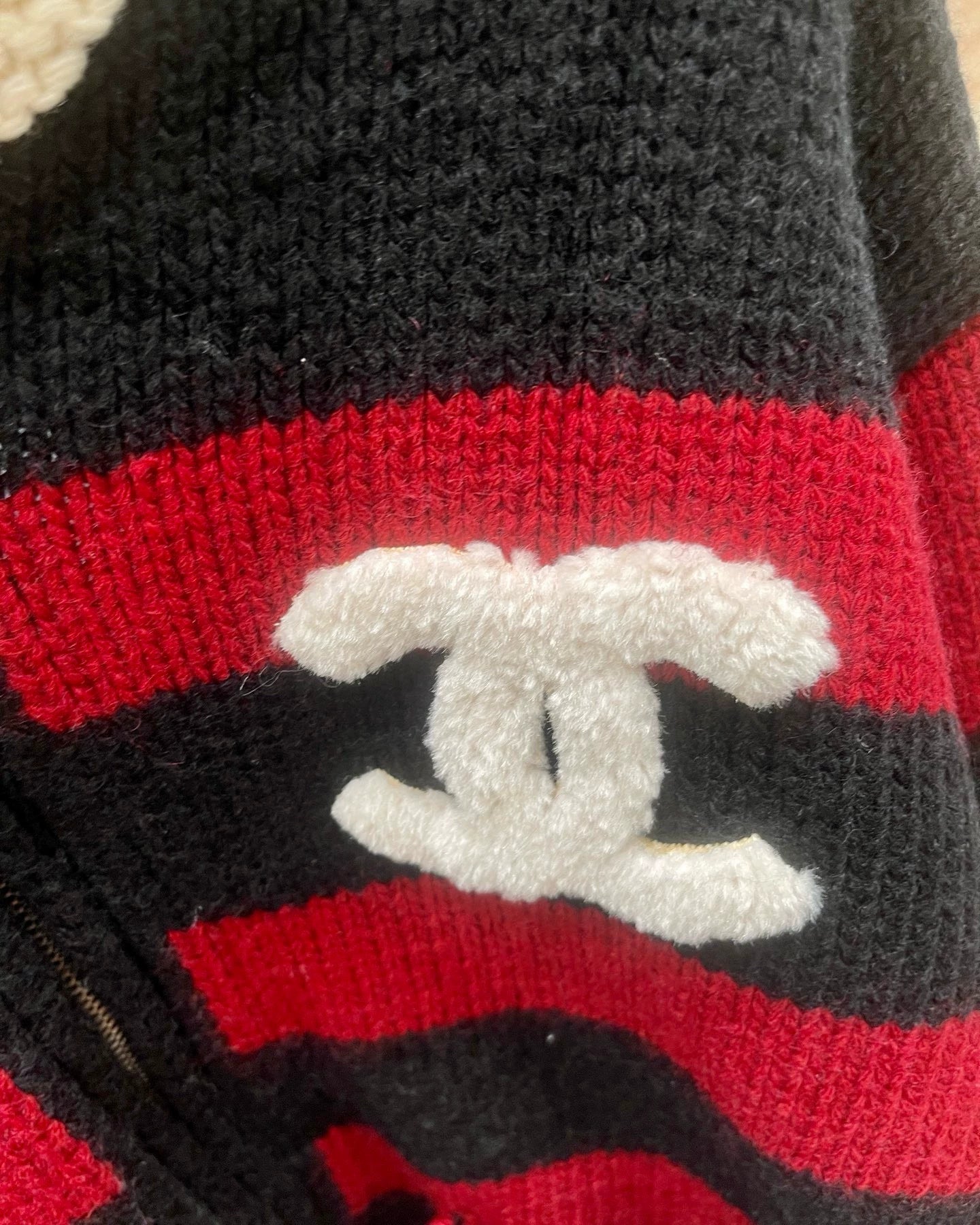 Red and black striped knitted cardigan