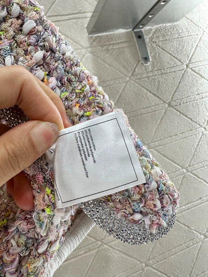 25 Knitted tweed cardigan and skirt set