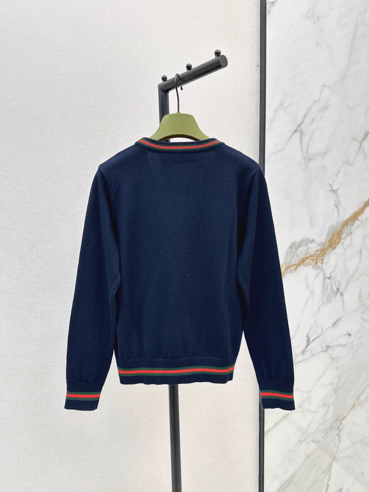 25 Knitted cardigan with woven pattern and V-neck