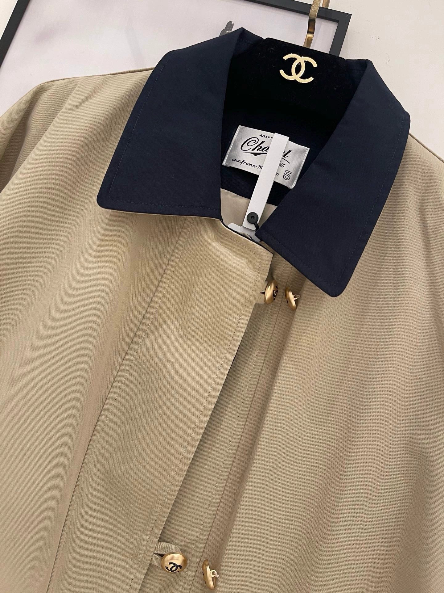 Golden button windbreaker jacket