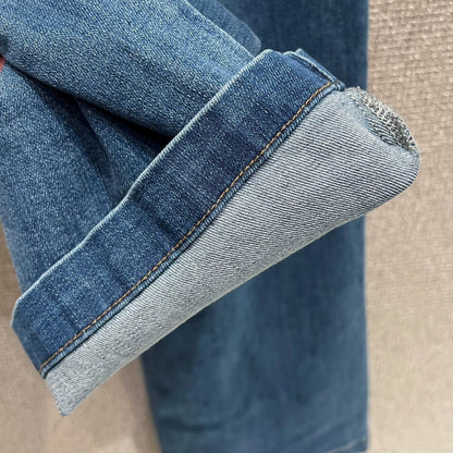 Pearl and rhinestone embellished wide-leg jeans