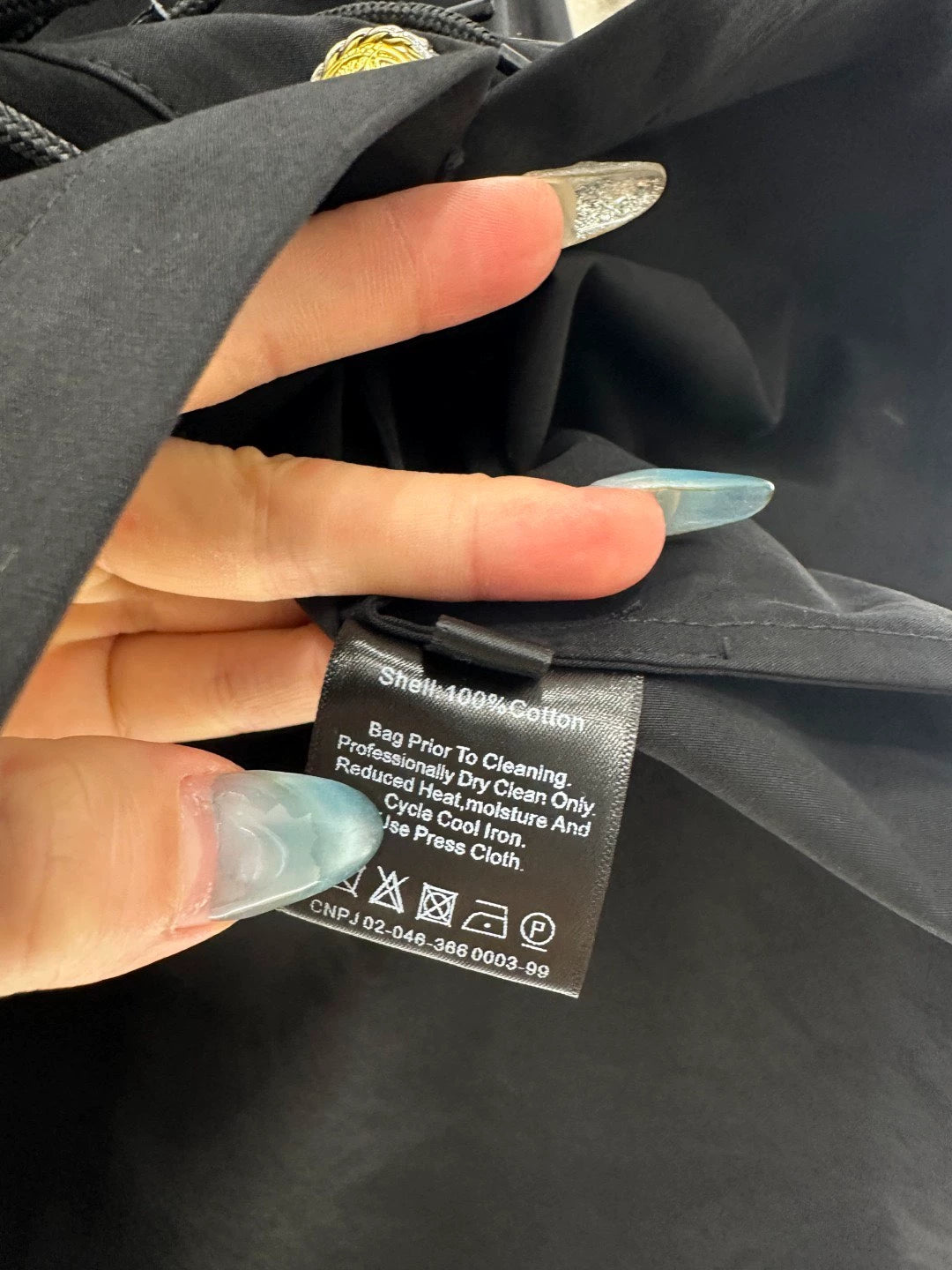 Artistic collar button tassel long sleeved shirt