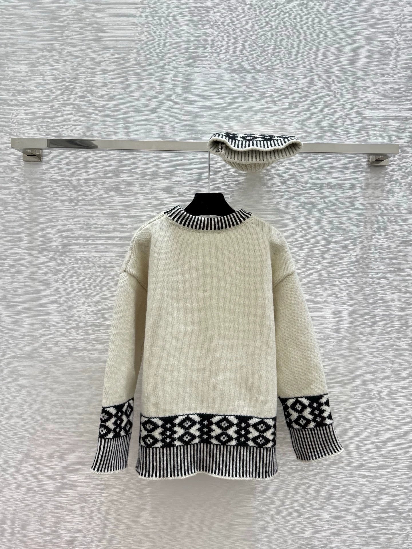 Black and white contrasting diamond patterned sweater