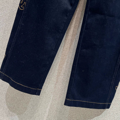 Side-embroidered washed denim jeans