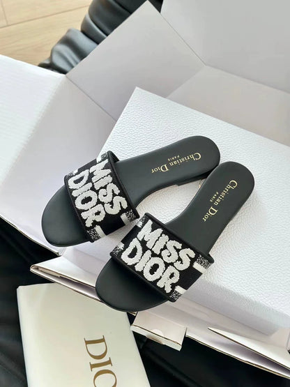 Embroidered letter slippers