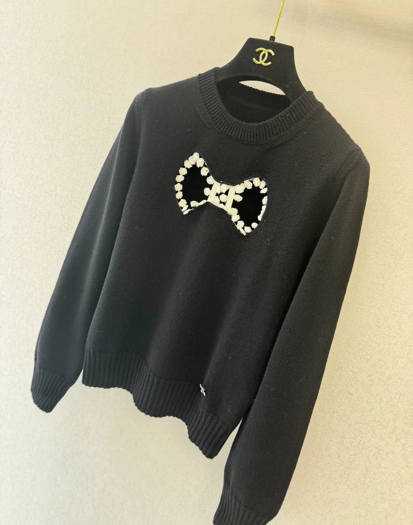 Bow hollow knitted sweater