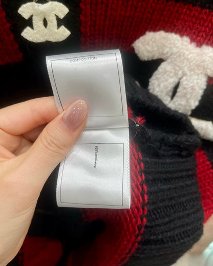 Red and black striped knitted cardigan