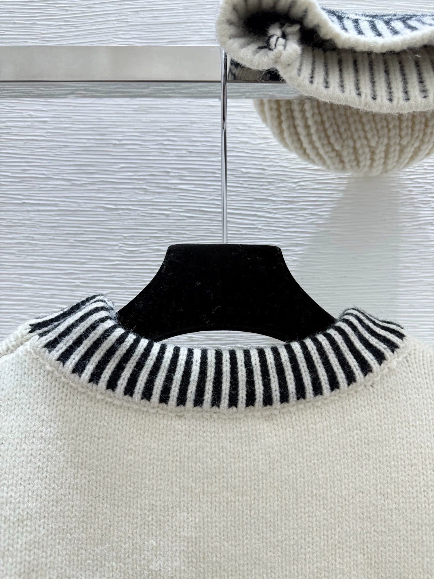 Black and white contrasting diamond patterned sweater