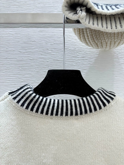 Black and white contrasting diamond patterned sweater