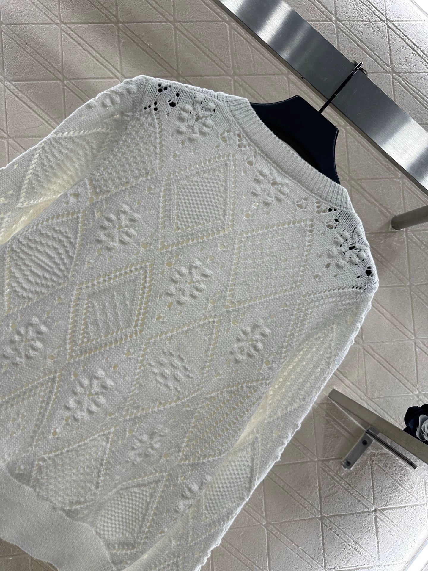 Hollow jacquard knitted cardigan