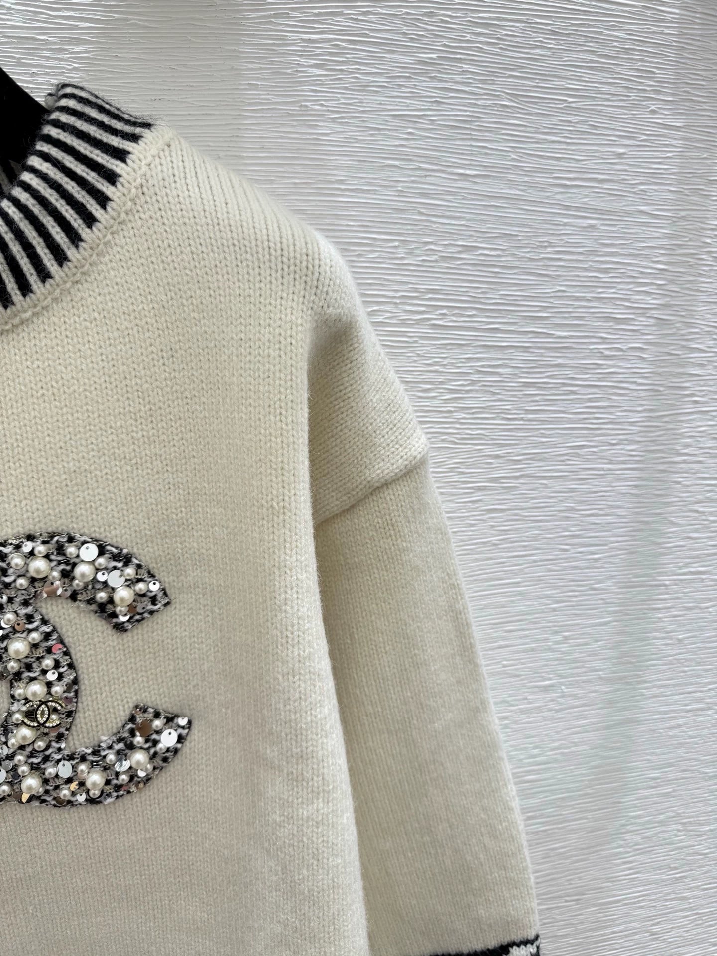 Black and white contrasting diamond patterned sweater