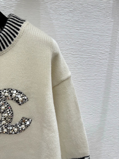 Black and white contrasting diamond patterned sweater