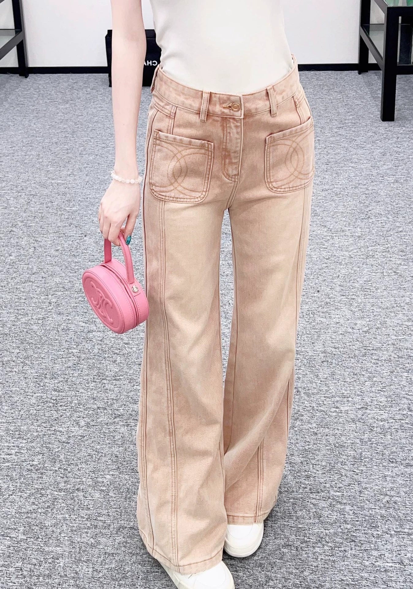 Pink ground white straight leg denim pants