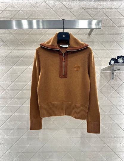 Knitted top with split leather collar