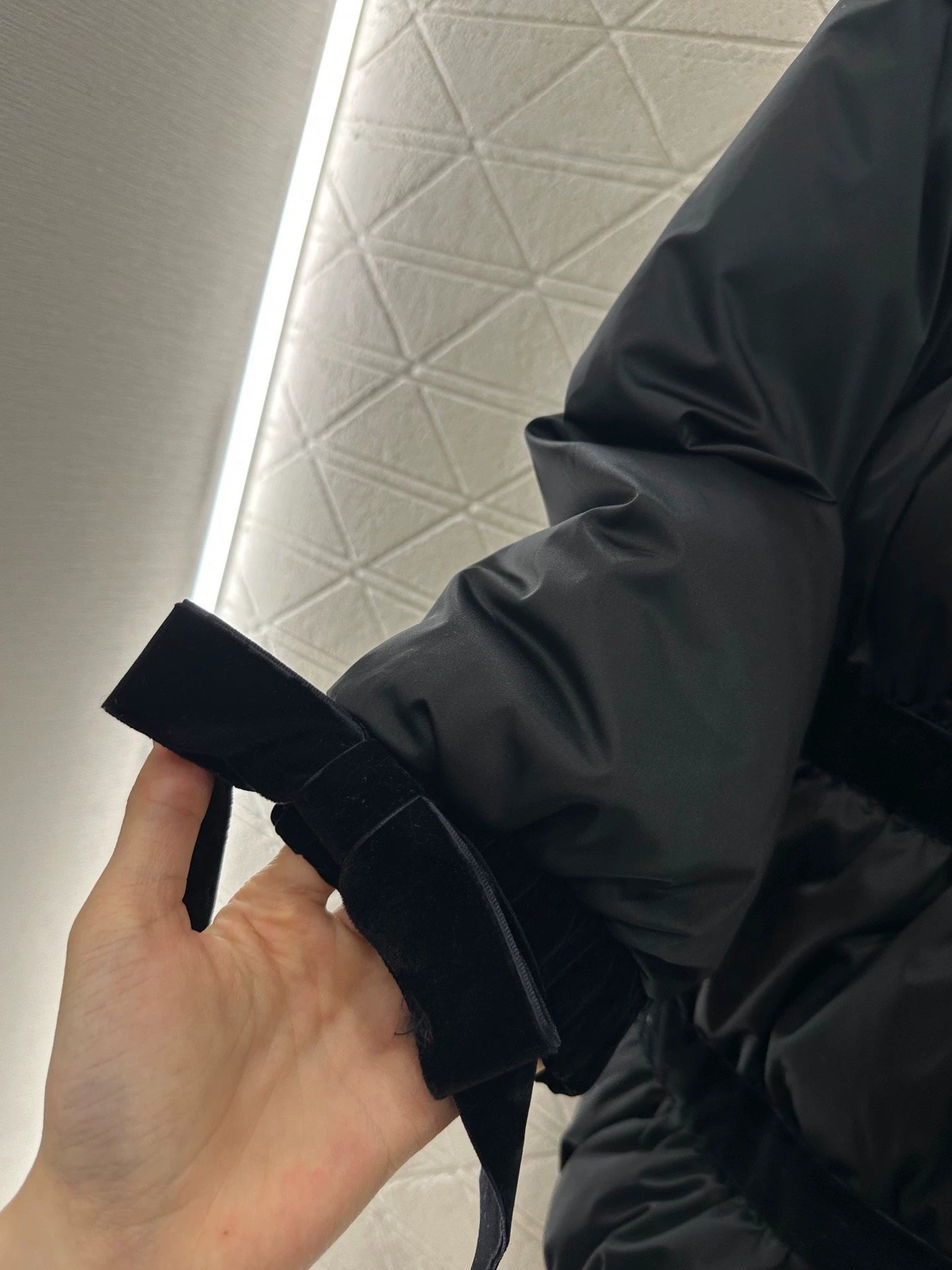 Velvet bow mid length down jacket