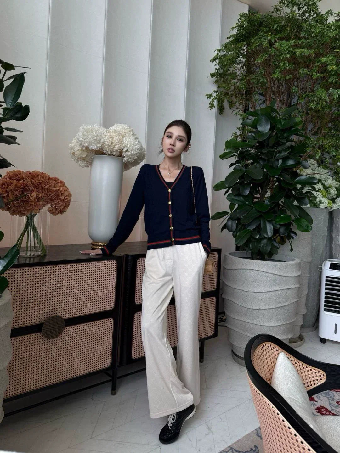 25 Knitted cardigan with woven pattern and V-neck