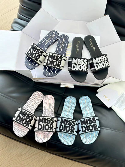 Embroidered letter slippers