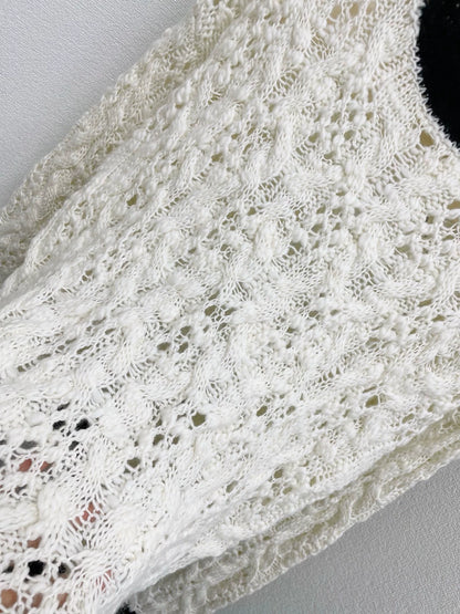 25fw Black and white color blocked hollow knitted sweater