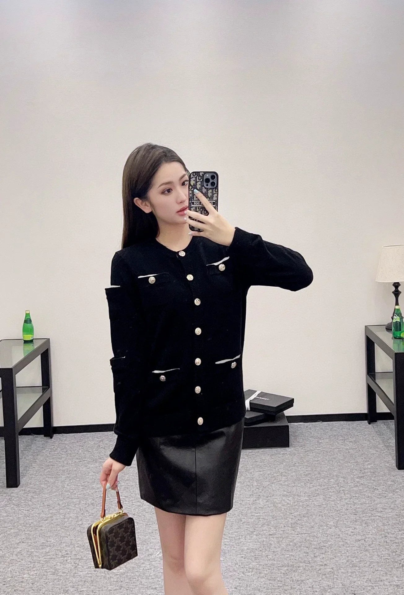 C 25 Multi-button knitted cardigan