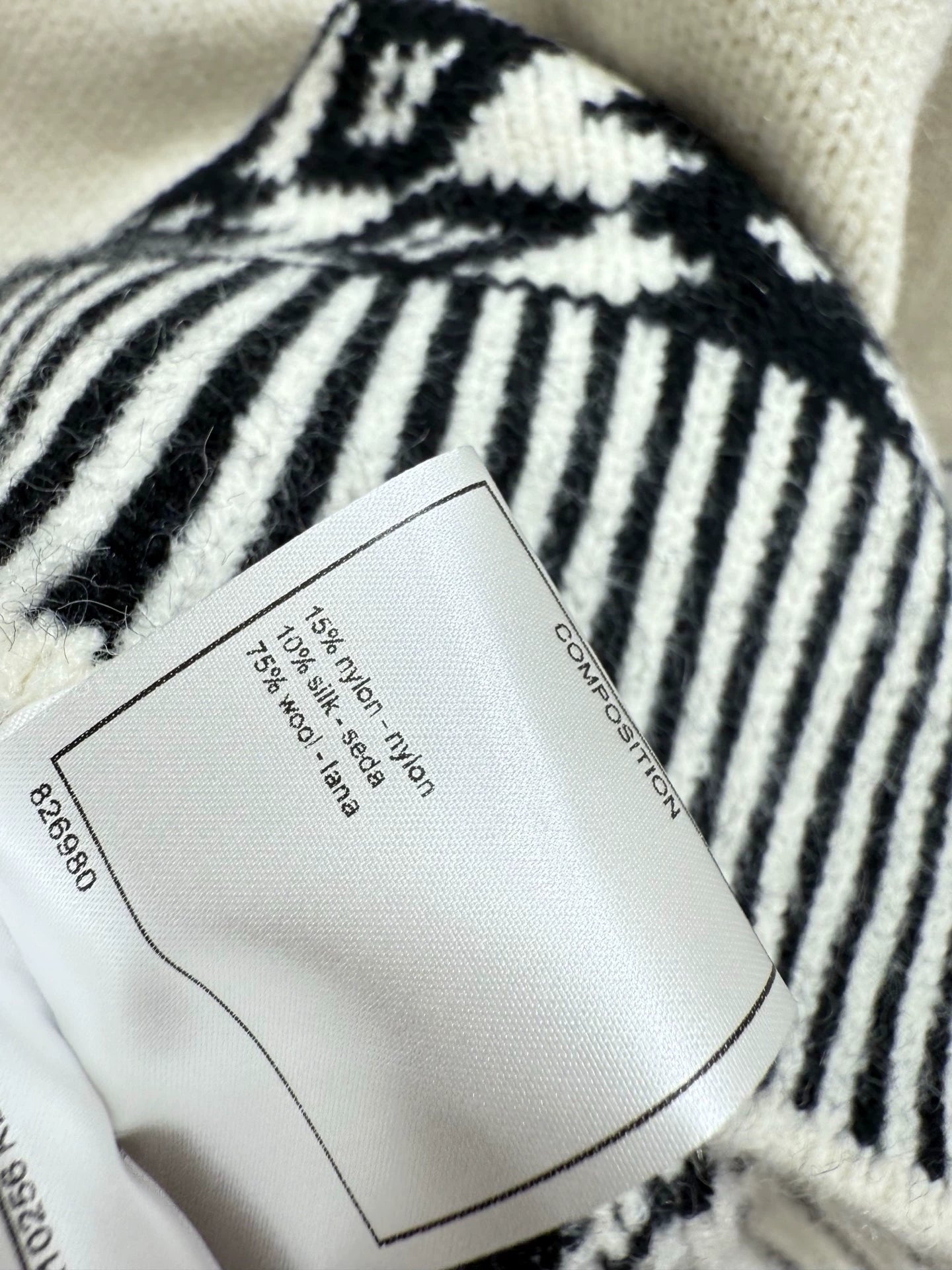 Black and white contrasting diamond patterned sweater