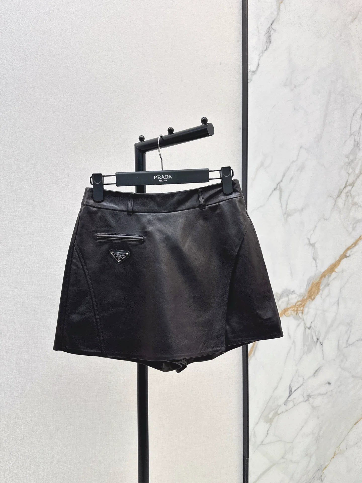 25fw Triangle logo sheepskin pants skirt