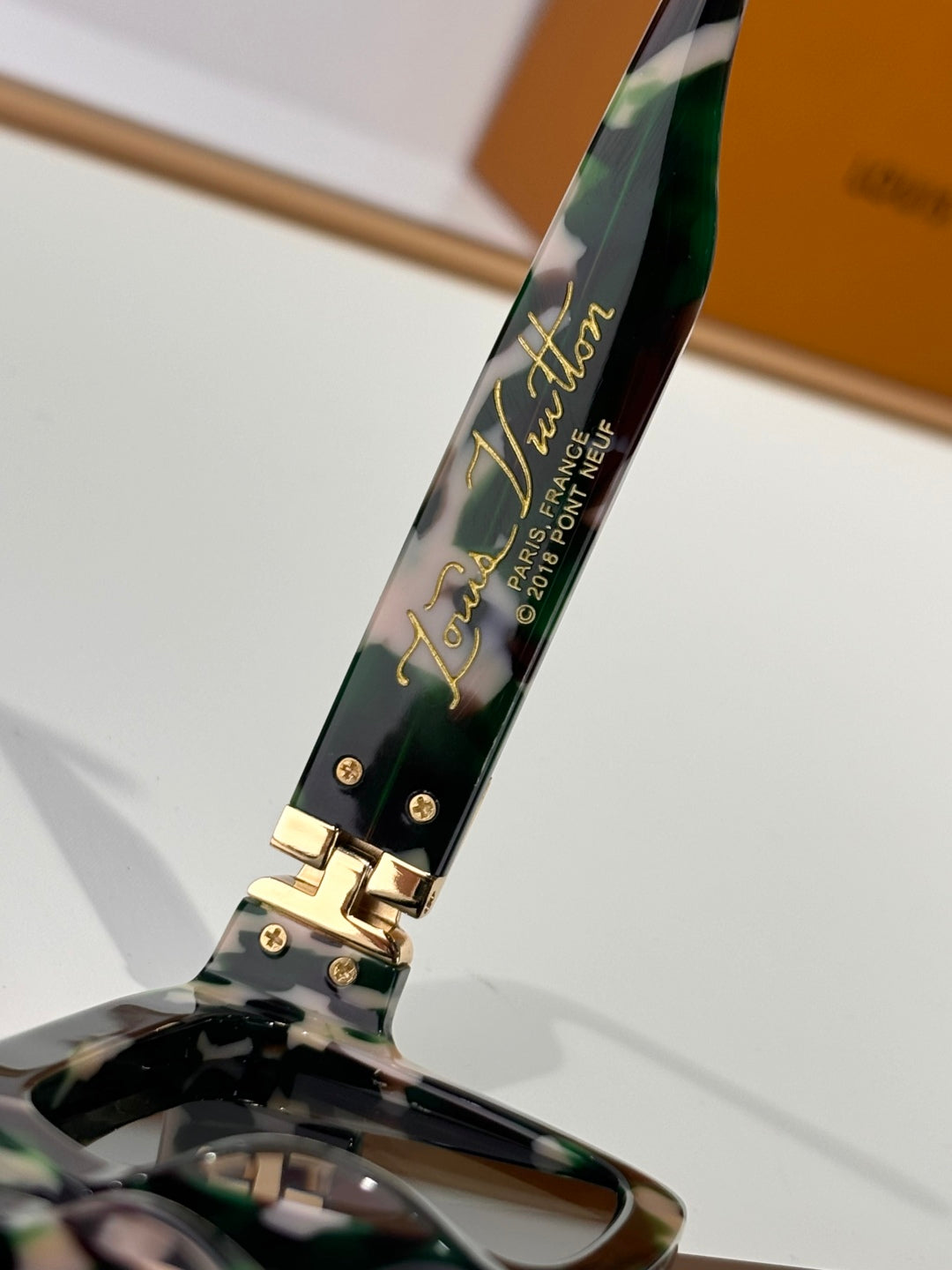 L milionair sunglasses