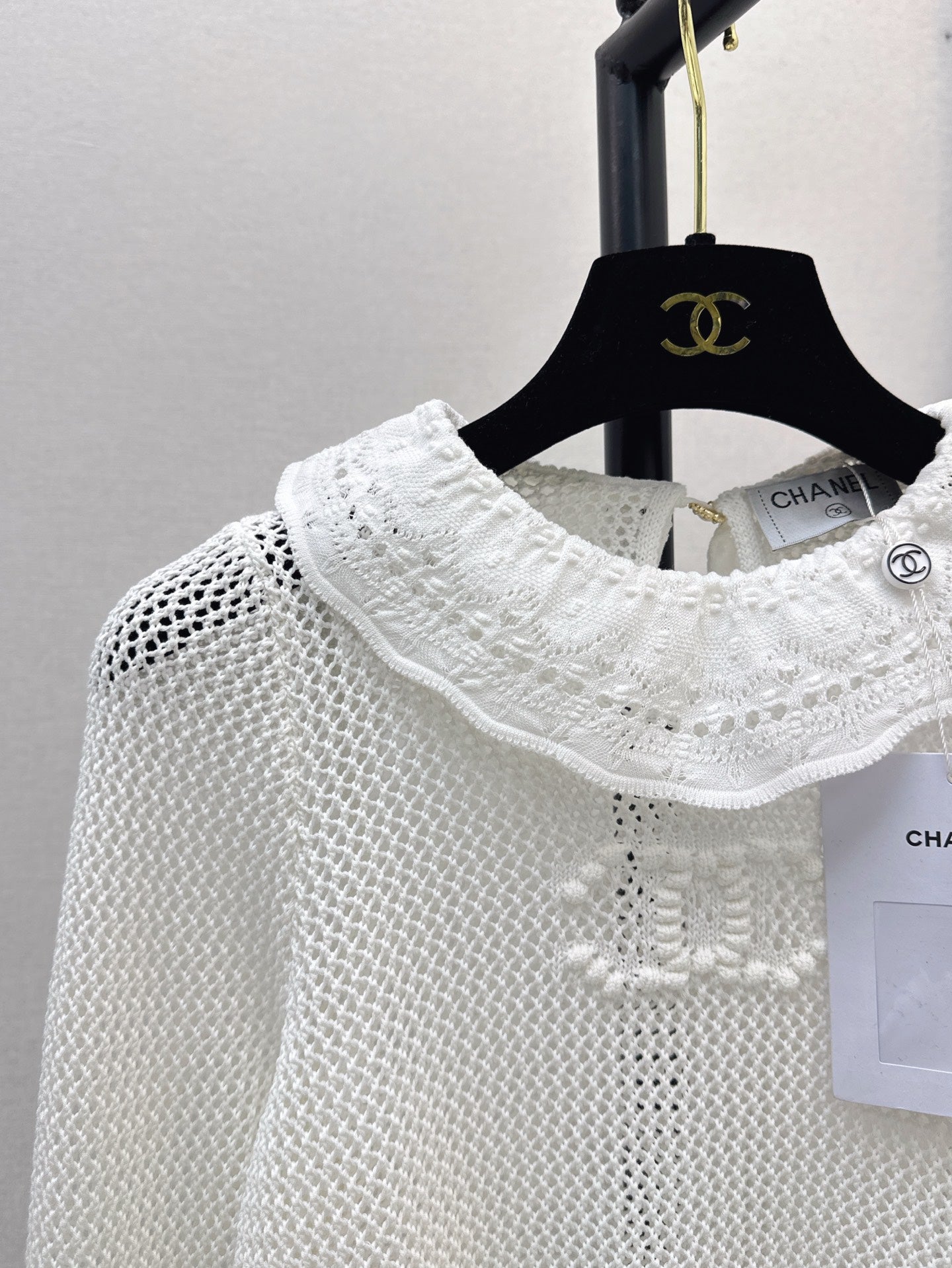 25ss knitted ruffle sweater