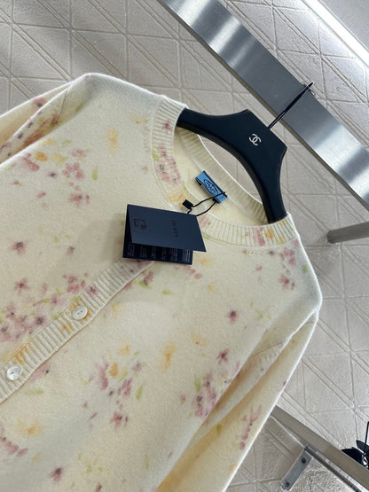 25 Floral light yellow knitted cardigan