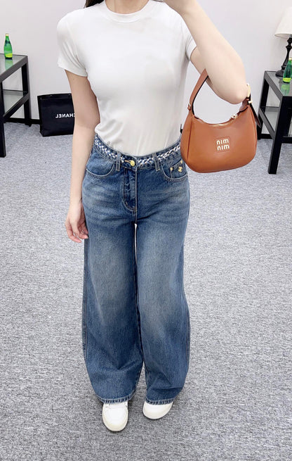 25 High-waisted bleached pleated denim trousers