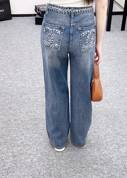 25 High-waisted bleached pleated denim trousers