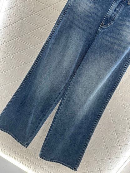 25 High-waisted bleached pleated denim trousers