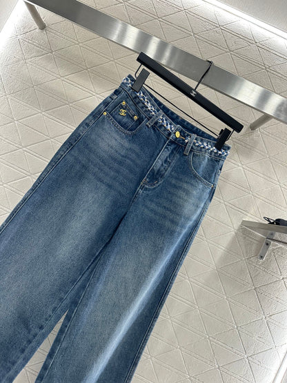 25 High-waisted bleached pleated denim trousers