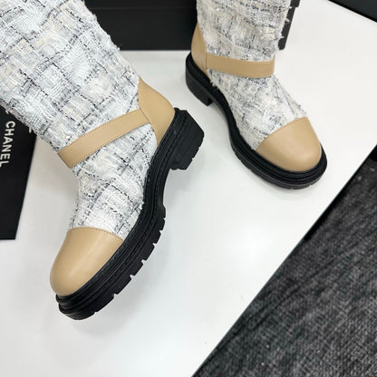 25 Cowhide and cloth lined mid calf boots