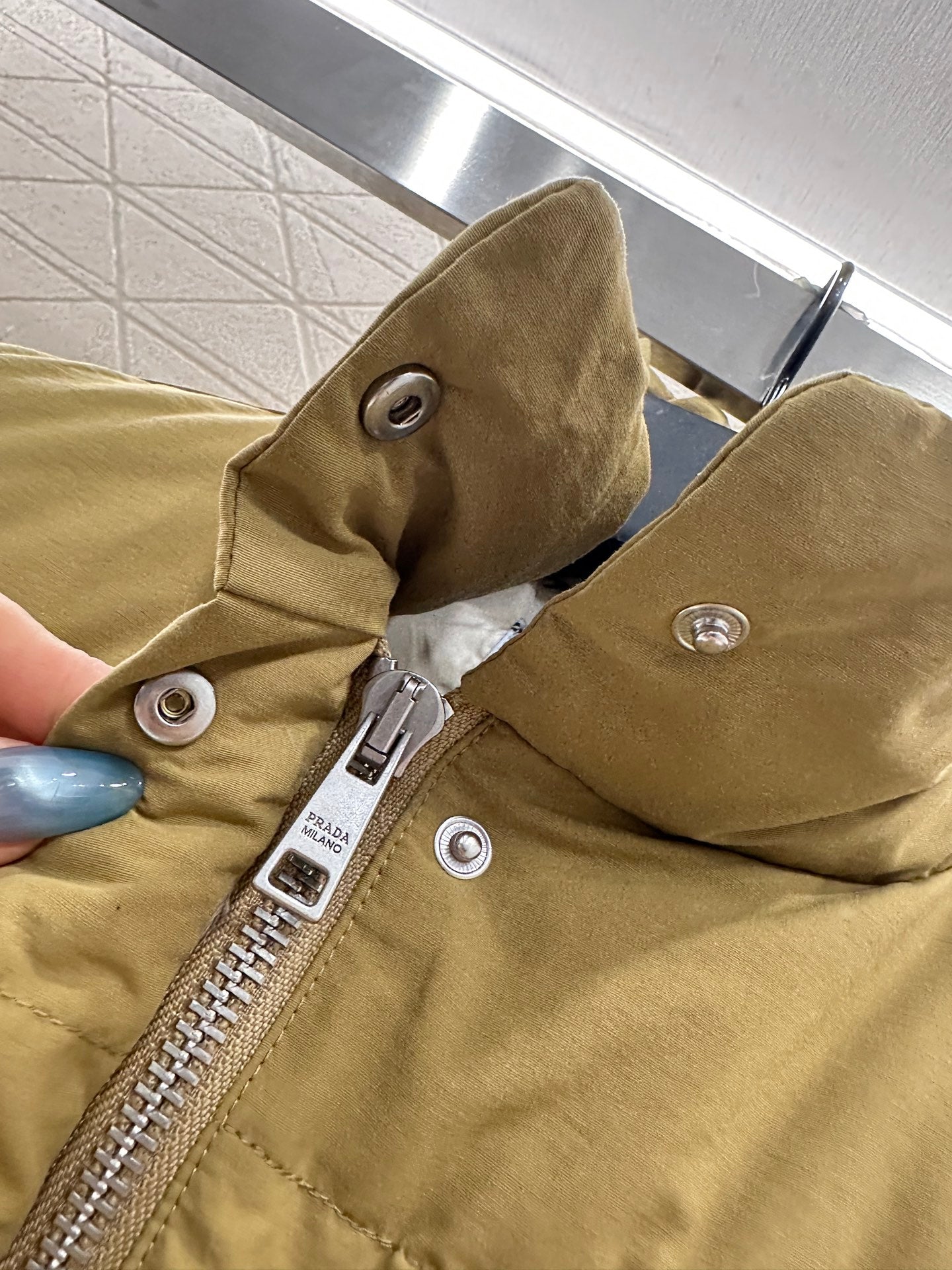 25 Standing collar down vest