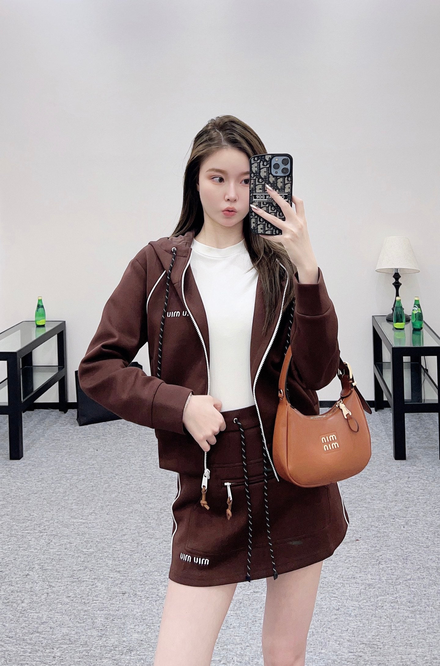 25 Hooded jacket and short skirt set