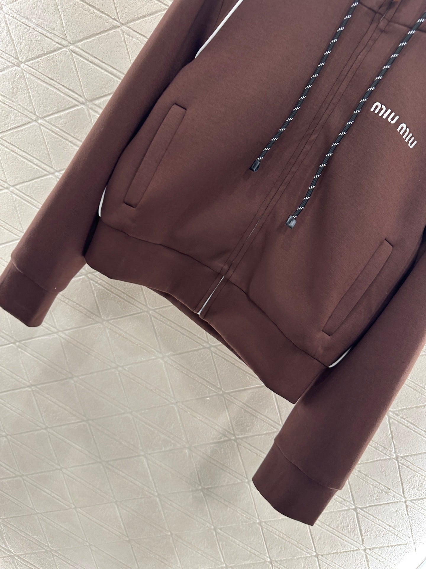 25 Hooded jacket and short skirt set