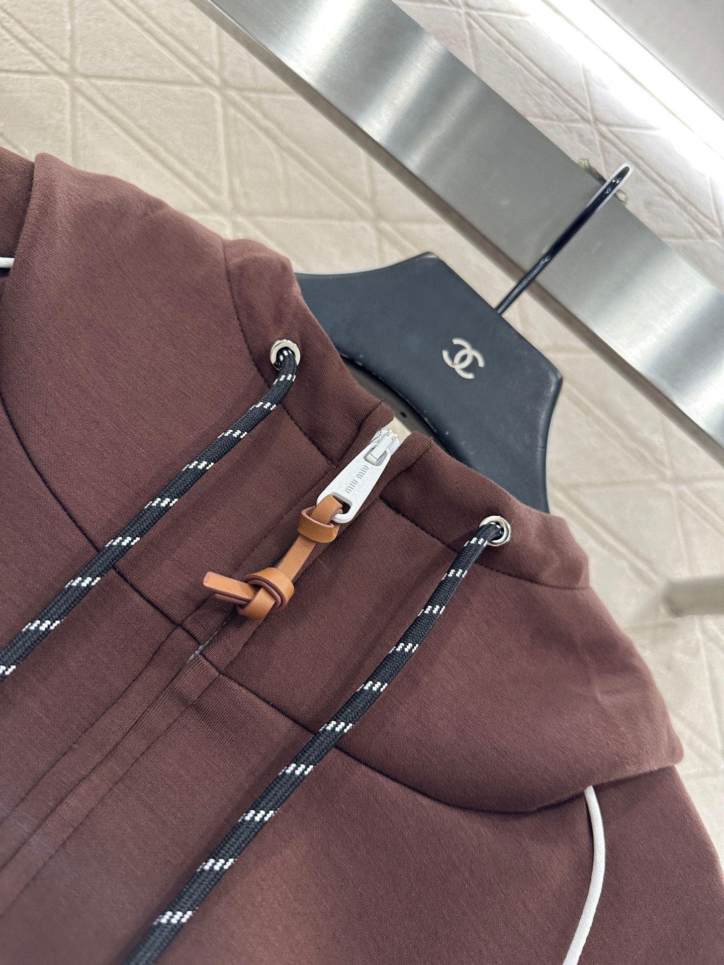 25 Hooded jacket and short skirt set