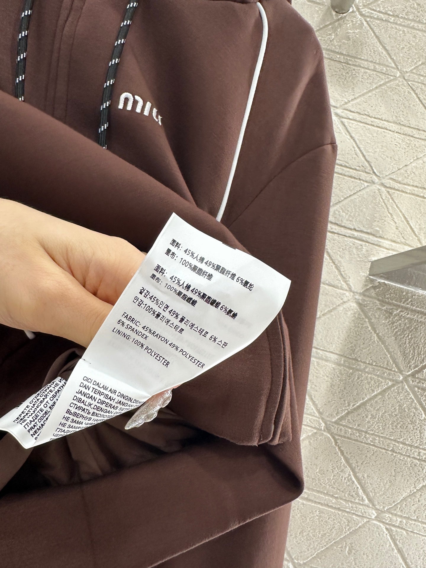 25 Hooded jacket and short skirt set