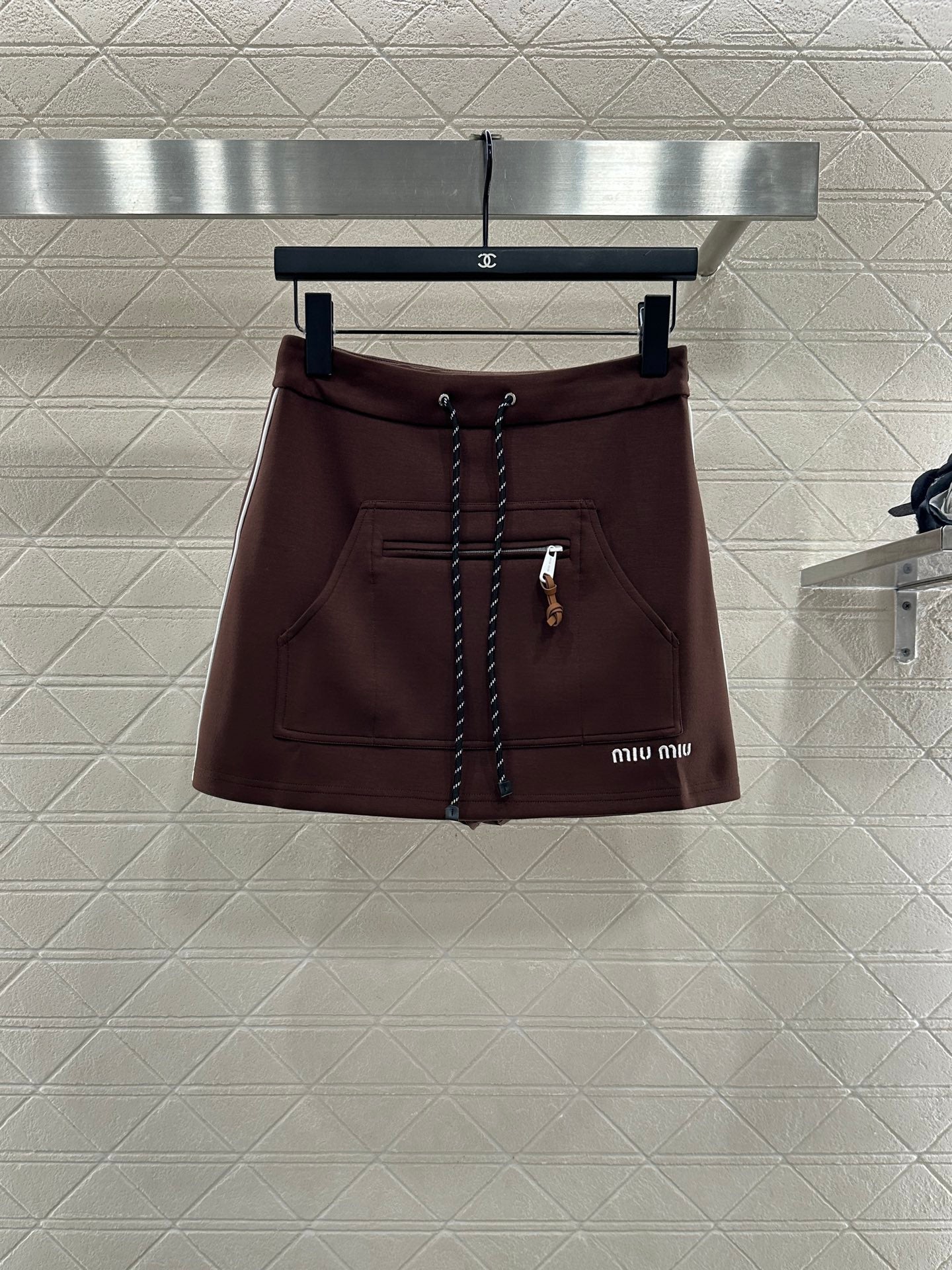 25 Hooded jacket and short skirt set