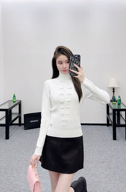 25 Bow tie high neck long sleeved sweater