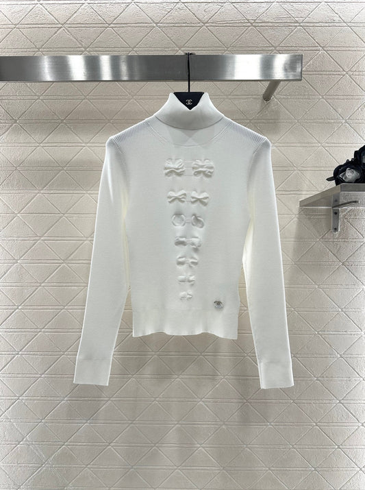 25 Bow tie high neck long sleeved sweater